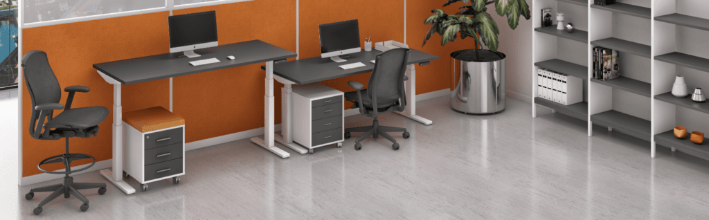 Modern office space featuring the Fly Height Adjustable Desk. Minimalist design with gray and white accents.