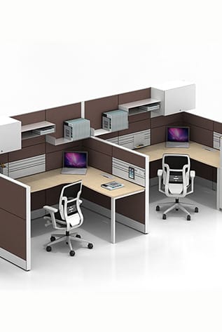 Office cubicles with low partitioning screens, desks, chairs, and storage.