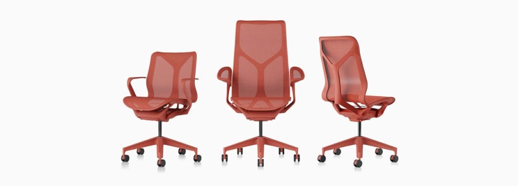 Three terracotta Cosm chairs by Herman Miller, ergonomic mesh design for office or home.