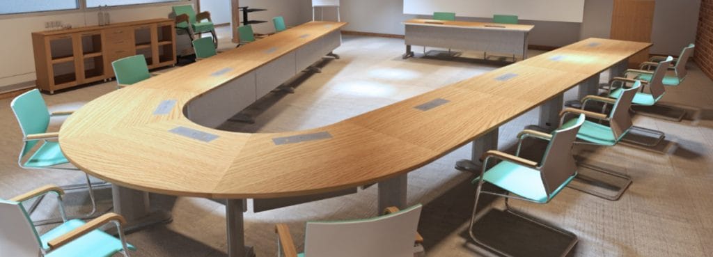Ergo Conference table in U-shape, light wood finish with teal chairs. Modern office furniture.