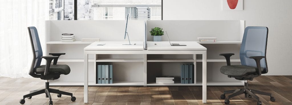 Ergonomic Essai task chairs in a modern open office space with white desks and shelving.