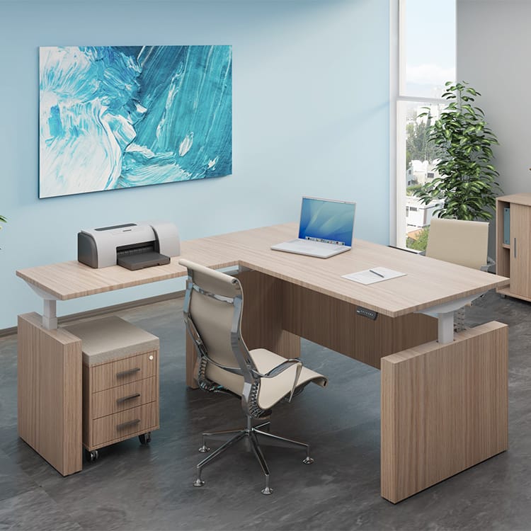 A modern office showcasing the Fly Executive Height Adjustable Desk, paired with an ergonomic chair, laptop, printer, and a mobile drawer unit. The workspace is bright and organized, enhanced by a large window, striking abstract blue wall art, and a potted plant. Studio Office Cyprus