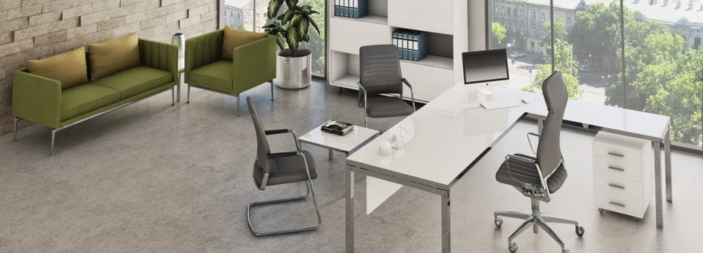 I-Work EVO Executive office setup with metal frames, white desk, olive sofa, and gray chairs. Modern, versatile design.