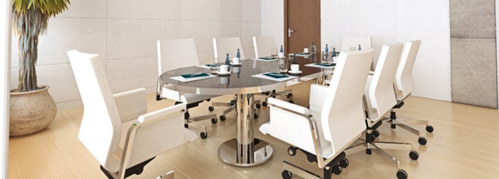 Manager EVO Conference table with white chairs in a modern office space.