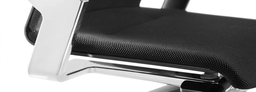 Close-up of the ON chair featuring a black mesh seat and chrome frame.