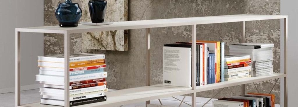 Modern Q18 Modular Shelving System in white. Minimalist design with books and decor.