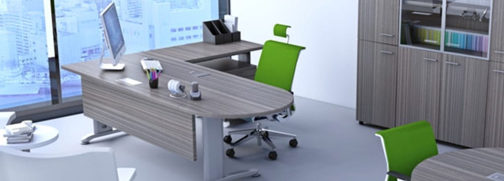 Modern Ergo Managerial desk with gray wood finish, green ergonomic chair, and storage cabinet in a studio office.