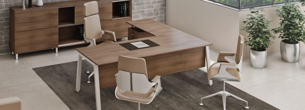 Modern office setup with a wood grain Lamda Managerial desk and ergonomic chairs.
