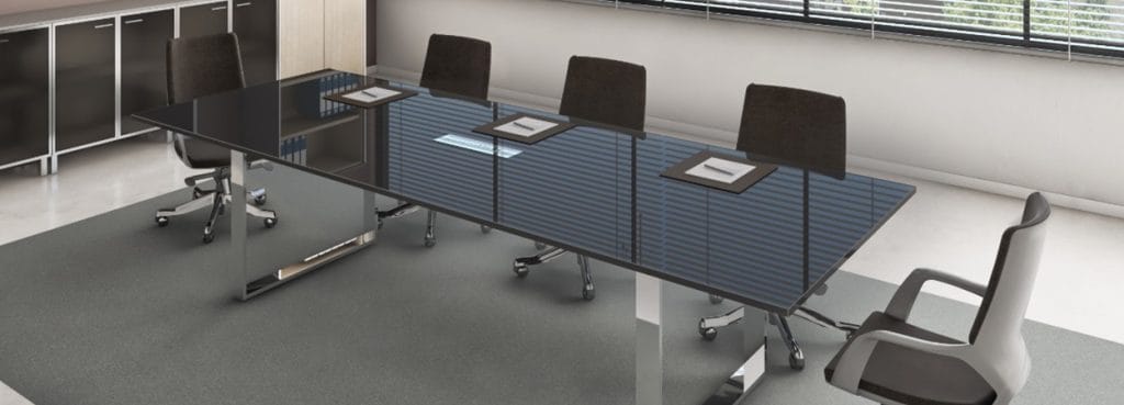 Sleek Leader Conference table with black glass top and modern chrome accents.