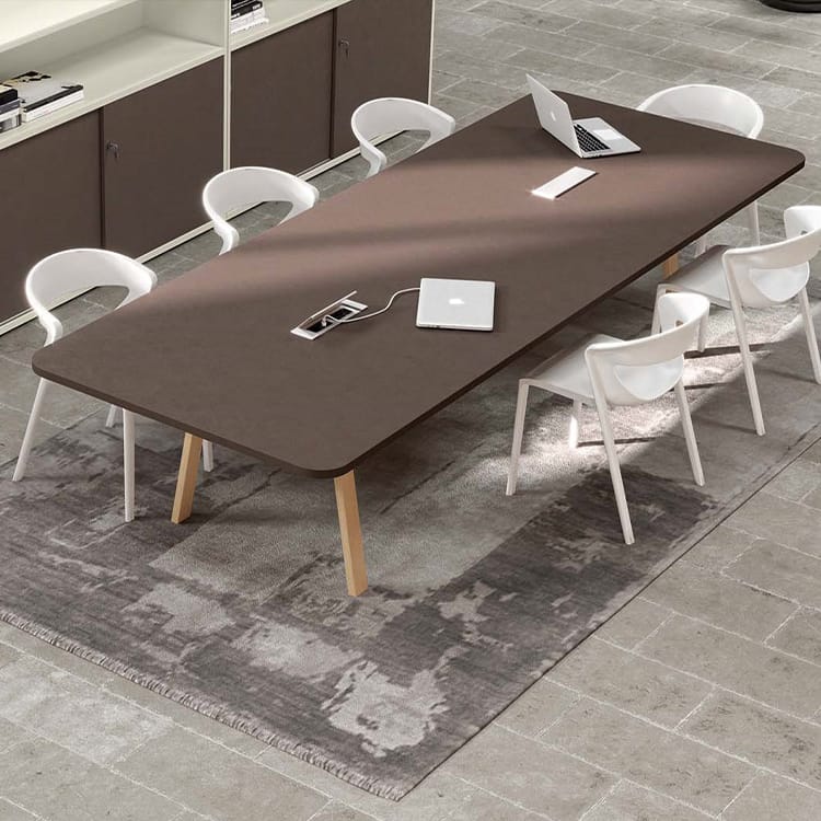 Modern Atreo Wood workstation with brown tabletop, light wood legs, and white chairs. Ideal for open spaces.