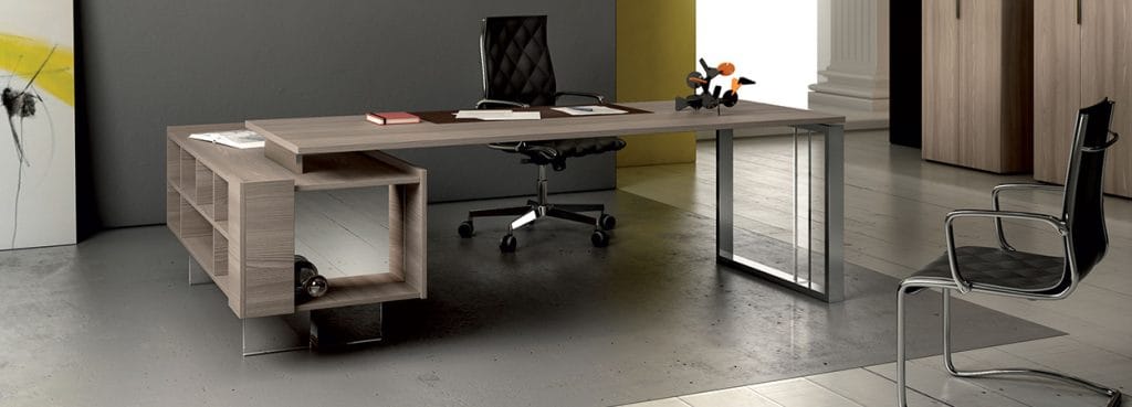 BIQUADRO desk in wood finish with metal accents, paired with black office chairs.