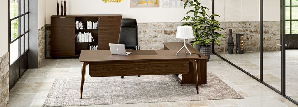 Modern office with Blade X desk in wood veneer. Executive design for private offices and managerial rooms.