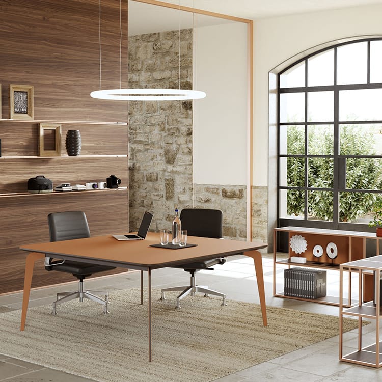 Alea Blade X Executive Meeting Table with a sleek, minimalist design in a modern office space.