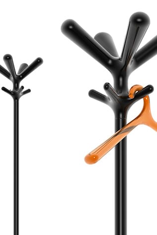 Modern black coat hangers with orange hanger. Stylish storage for coats, hats, and bags.