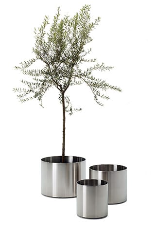 Minimalist Rexite Desk Sets with sleek, stainless steel cylindrical design. Modern desk accessories.