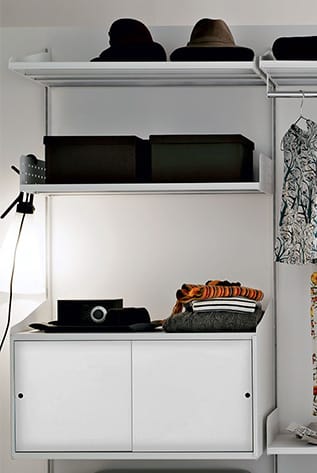 Stylish white Rexite Modular Systems unit with shelves, storage, and accessories. Organize any space with customizable design.