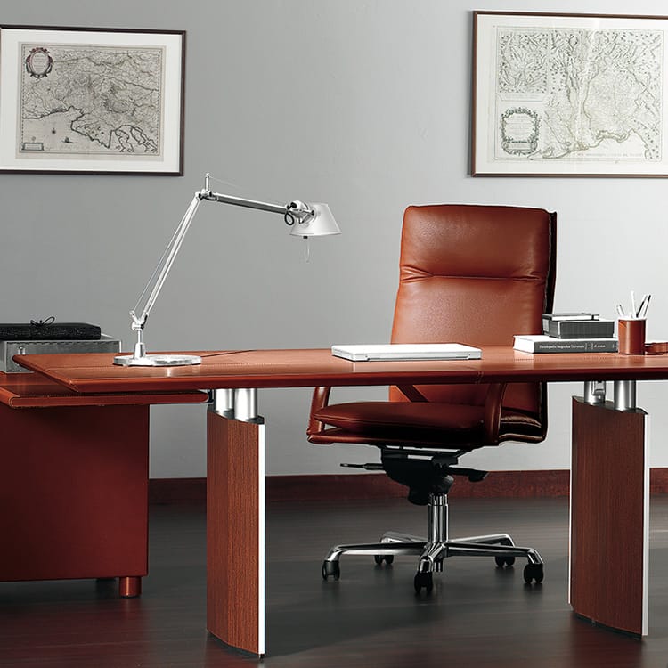 Elegant Epico executive desk in hard leather with a matching chair and wood base.