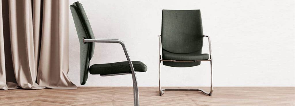 Modern Galassia visitor chairs. Green fabric seat and back with a sleek chrome frame.