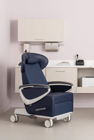 Blue vinyl Healthcare Furniture chair with wheels, designed for comfort and mobility in medical settings.