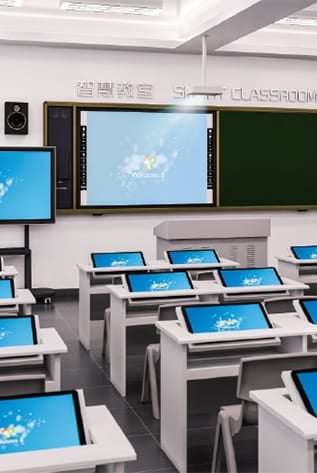 Modern laboratory furniture: White desks with built-in monitors in a classroom setting.