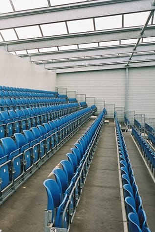 Blue stadium seating. Seating and Staging Solutions for events, venues, and arenas.