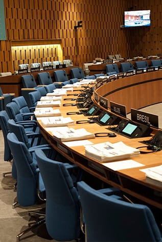 Modern Lecture Halls with blue chairs and wooden desks for enhanced learning environments.