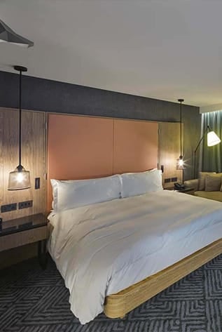 Elegant hotel room with stylish furniture. Comfortable beds for Hotels, modern design.