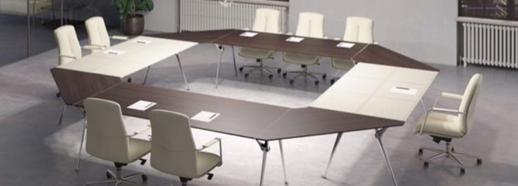U-shaped Genesis Conference Table with brown and cream surfaces, surrounded by office chairs.