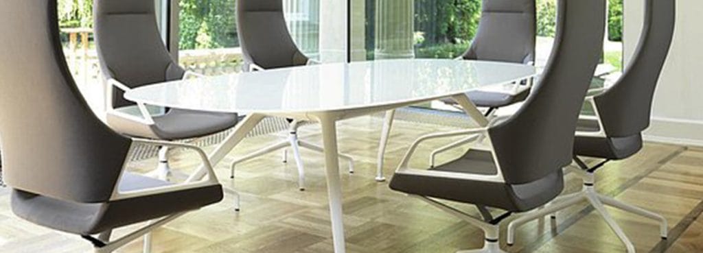 Modern Graph Conference Table with gray chairs and a white frame.