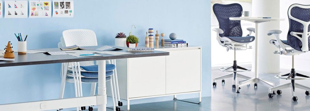 Ergonomic Mirra 2 Stool in blue mesh. Studio 7.5 design for Herman Miller. Comfortable seating for social spaces.
