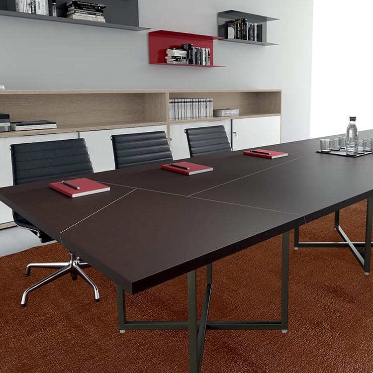 Contemporary IBIS Conference Table featuring a dark wood finish and metal legs in a modern office setting.