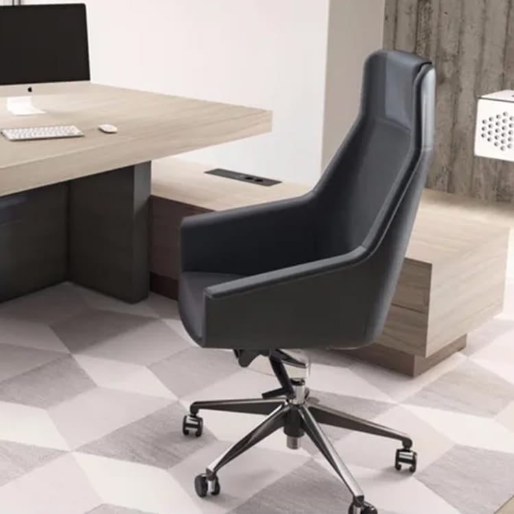 Modern black Jera Executive chair with armrests and a chrome base.