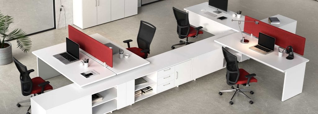 Modern Kompas workstation with white desks, red accents, and ergonomic chairs. Open-space office design.