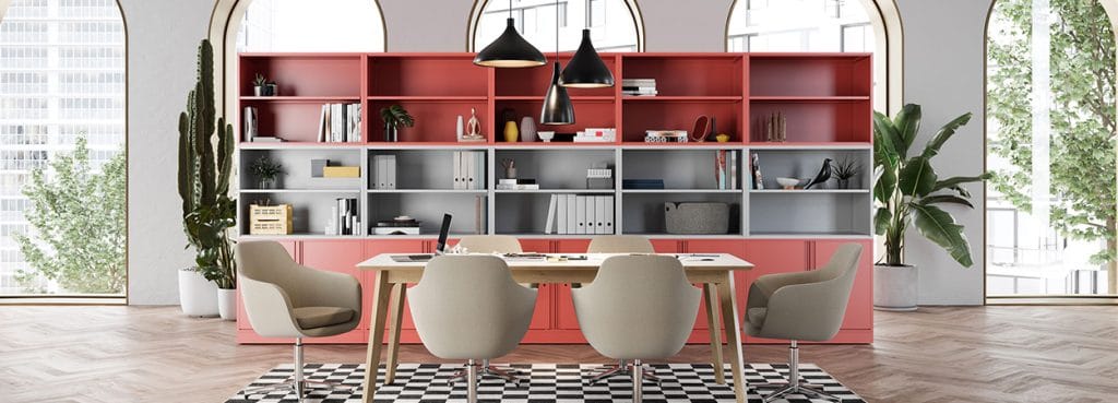 Modern office with coral Meridian Office Storage Solution, table, and chairs.