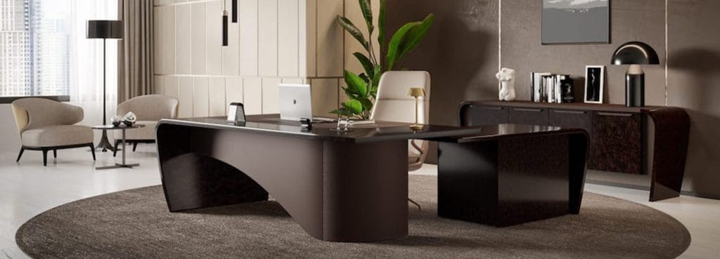 Modern office with a Mithos Executive Conference Table, brown wood finish, and curved design.