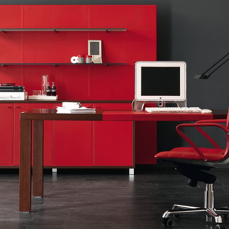 Wenge wood Mobius desk with red leather details, cabinets, and shelves.