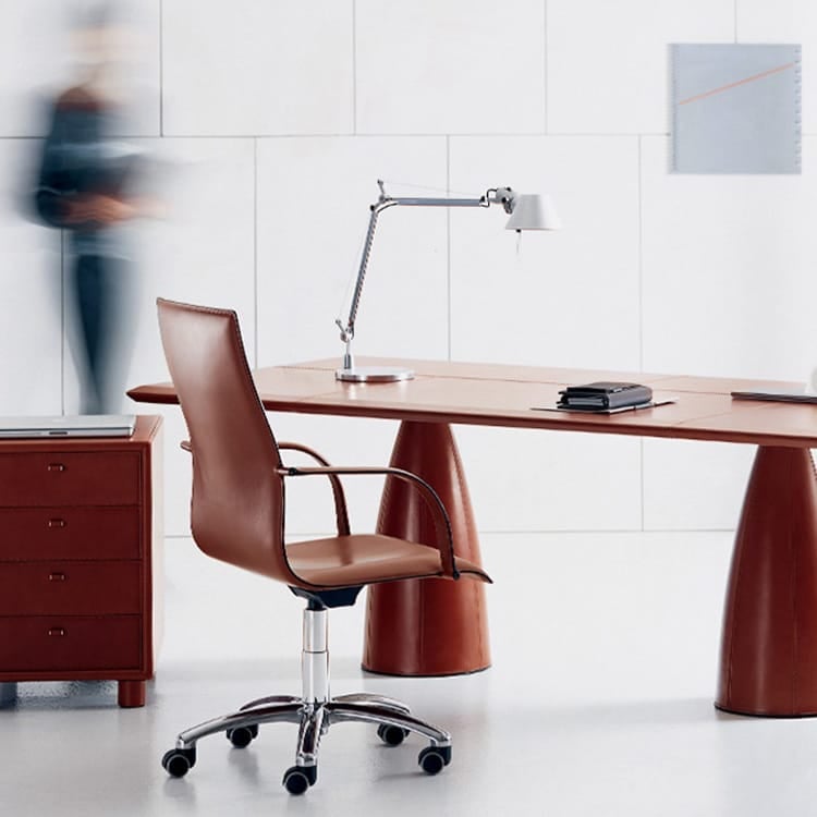Mythos desk and chair. Brown leather executive office furniture with modern chrome lamp.