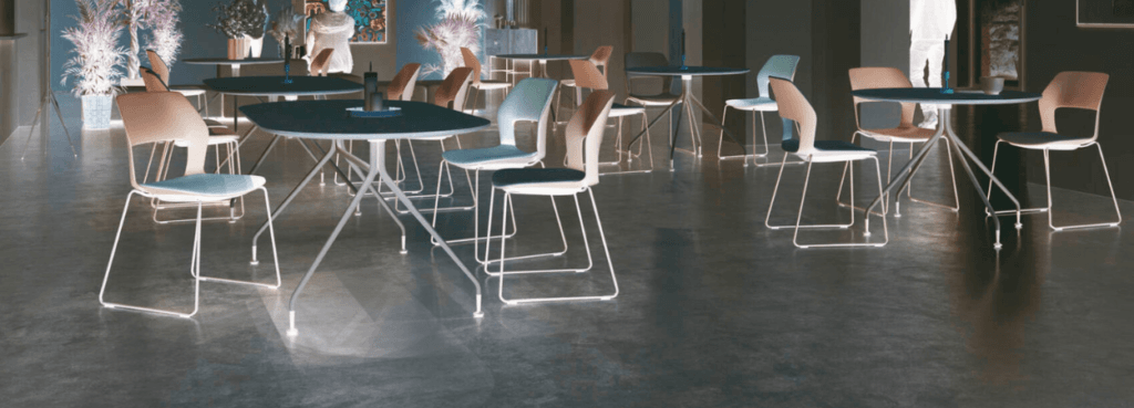 Modern meeting space with Occo Conference Table, featuring sleek design, metal frame, and stylish chairs for dynamic collaboration.