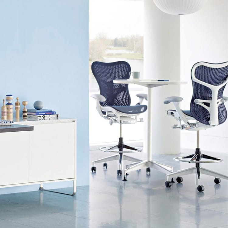 Studio 7.5 Mirra 2 Stool in blue mesh with a white frame. Modern ergonomic design.