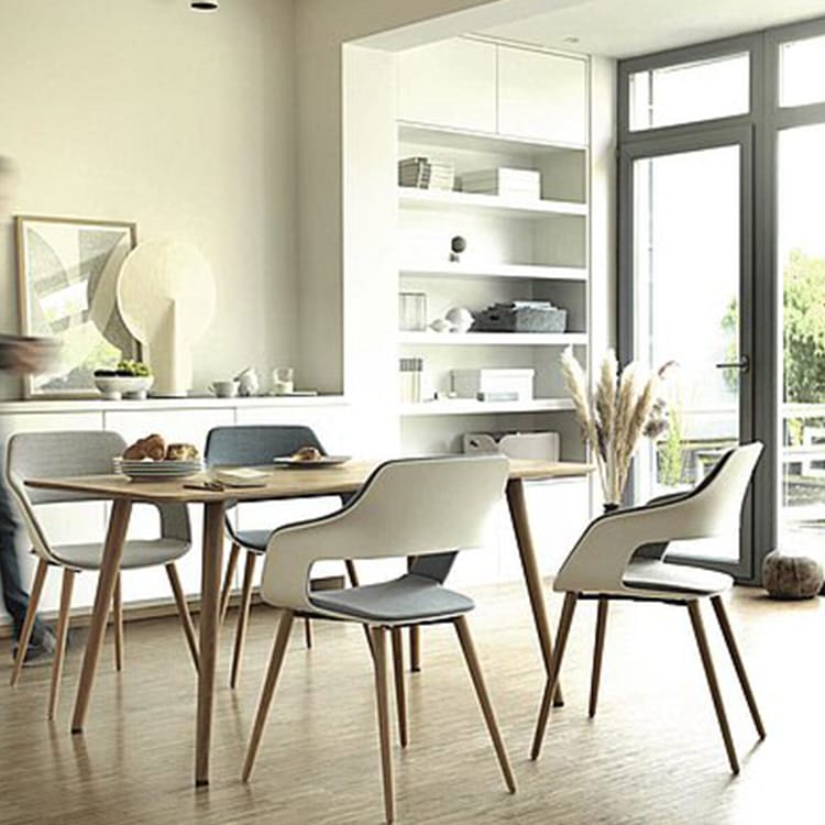 Wilkhahn OCCO chair in a modern dining room setting. Sleek design, comfortable seating.
