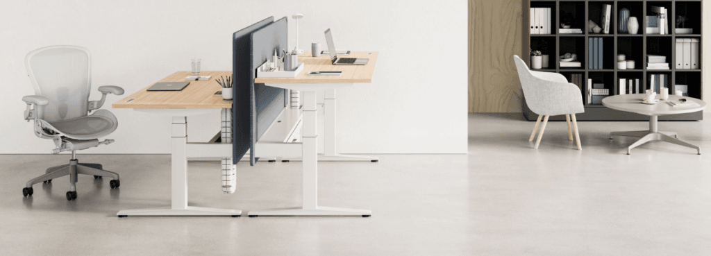 Modern office space with a Ratio adjustable desk and ergonomic chair.