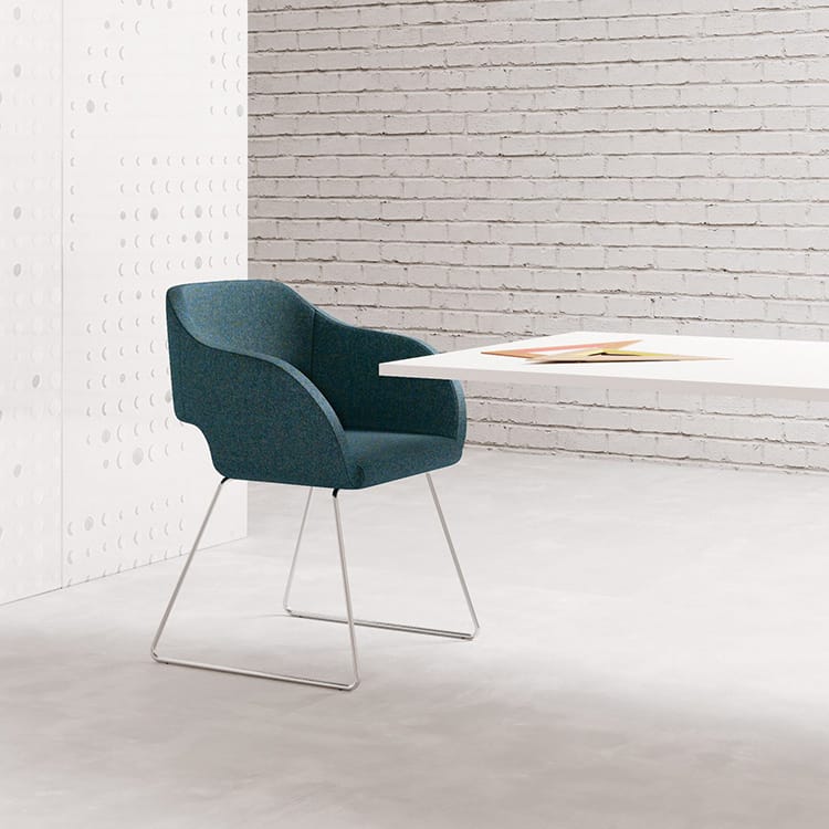 Teal Regia Visitor Chair with silver frame. Modern upholstered armchair for office meeting rooms.