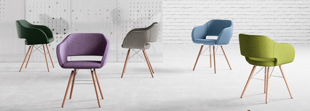 Colorful Regia conference chairs in green, purple, gray, blue, and lime with wooden legs.