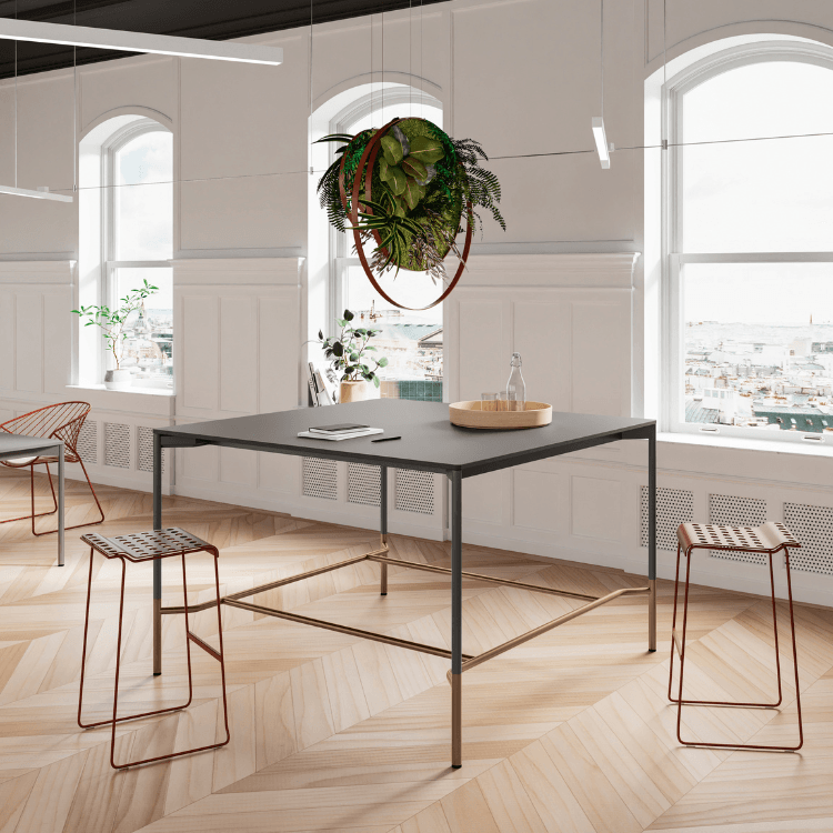 Contemporary office featuring Rendez-Vous table with stools, and hanging plant.