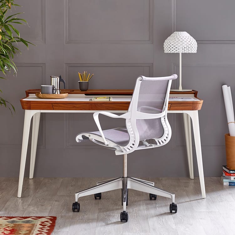 Modern Setu Visitor Chair in white and gray, angled view. Comfortable seating for offices and waiting rooms.