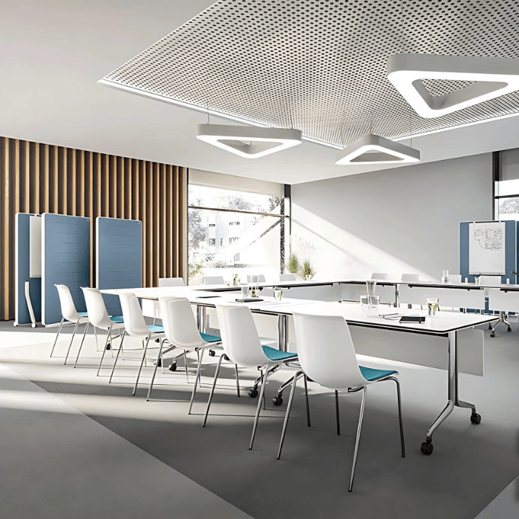 Modern conference room featuring white SHUFFLEis1 chairs with blue cushions around a white table.