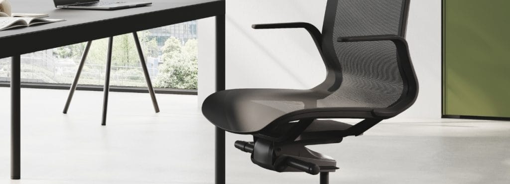 Trama executive chair in black mesh, ergonomic office seating.
