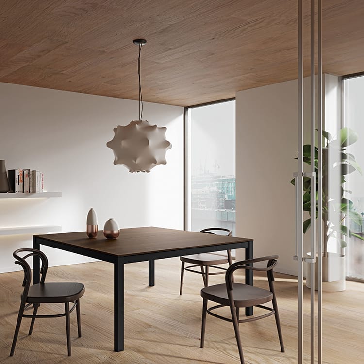 Modern Zefiros X desk in a light wood office. Sleek, minimal design.