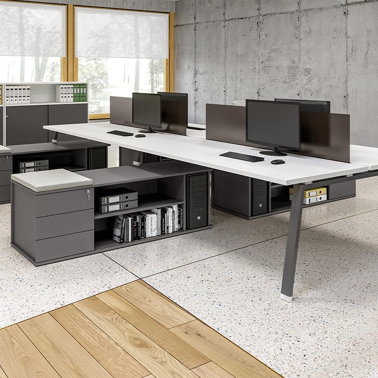 Alea Atreo workstation. White desks with grey storage in a modern office setting.