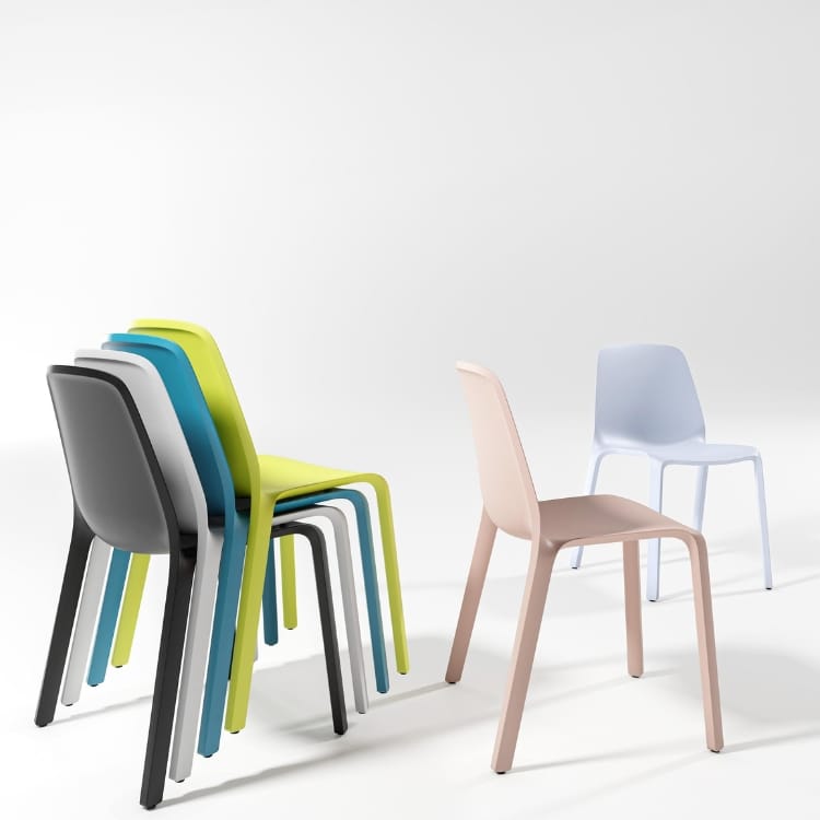 MONOis1 Interstuhl chair. Stackable design in black, white, blue, green, pink, and light blue.